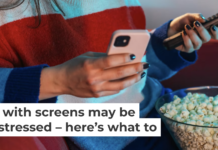 Using multiple digital devices at once can be highly distracting and overstimulating. Riska/E+ via Getty Images